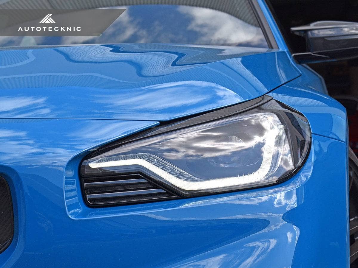 Kies-Motorsports AutoTecknic USA AutoTecknic Carbon Fiber Headlight Trim Set - G87 M2 G87 M2