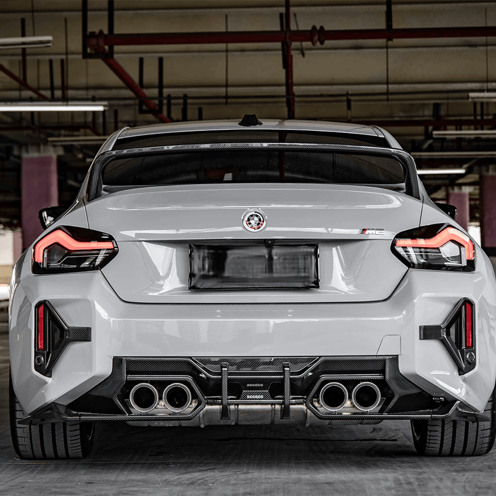 Kies-Motorsports NWCarbon Haus G87 SQ Dry Carbon Fiber Rear Bumper Trim