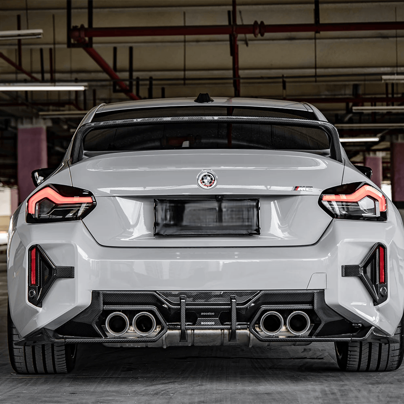 Kies-Motorsports NWCarbon Haus G87 SQ Dry Carbon Fiber Rear Bumper Trim