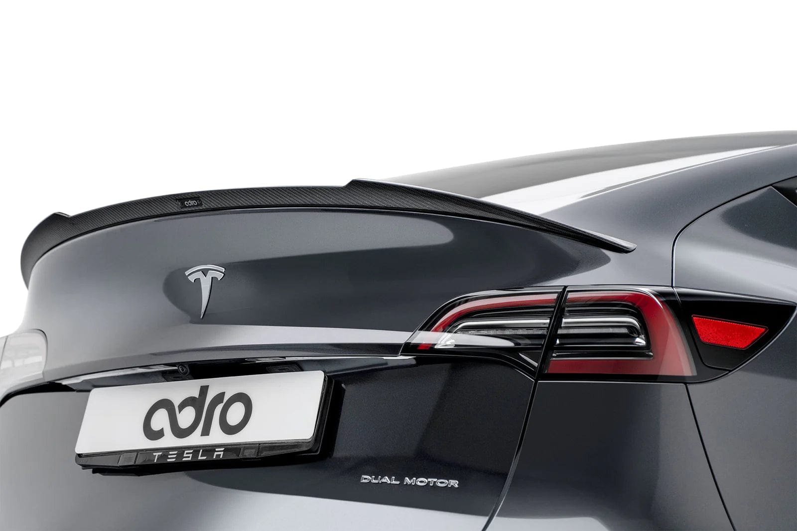 https://www.kiesmotorsports.com/cdn/shop/files/kies-motorsports-adro-adro-tesla-model-y-premium-prepreg-carbon-fiber-spoiler-30297248890965.webp?v=1687593967