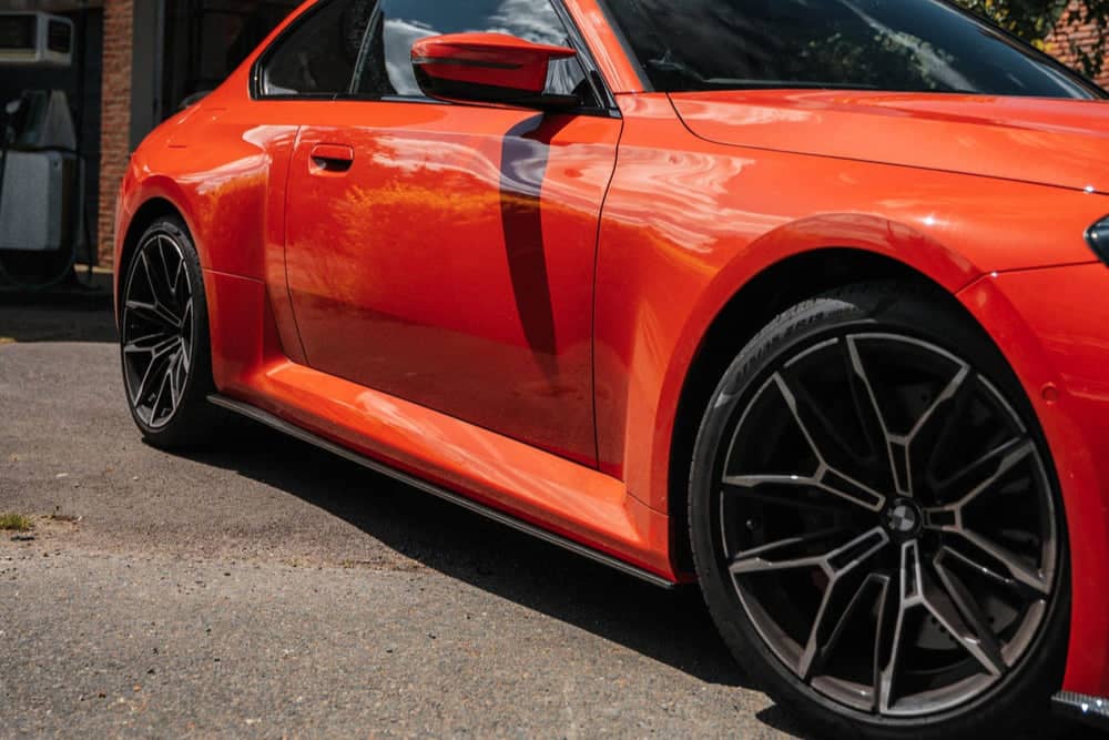 TREVORA G87 M2 Carbon Flat Side Skirt Set Secondary image