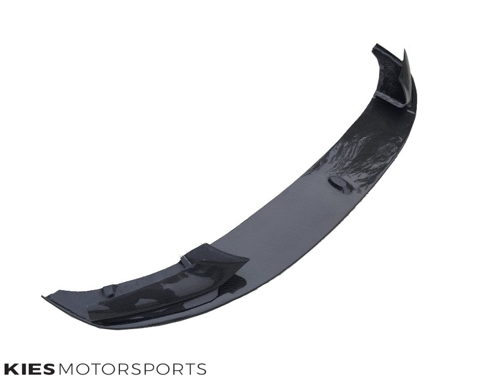 Kies Motorsports — Kies Carbon F10 front lip close-up showing dry carbon weave and clear coat finish
