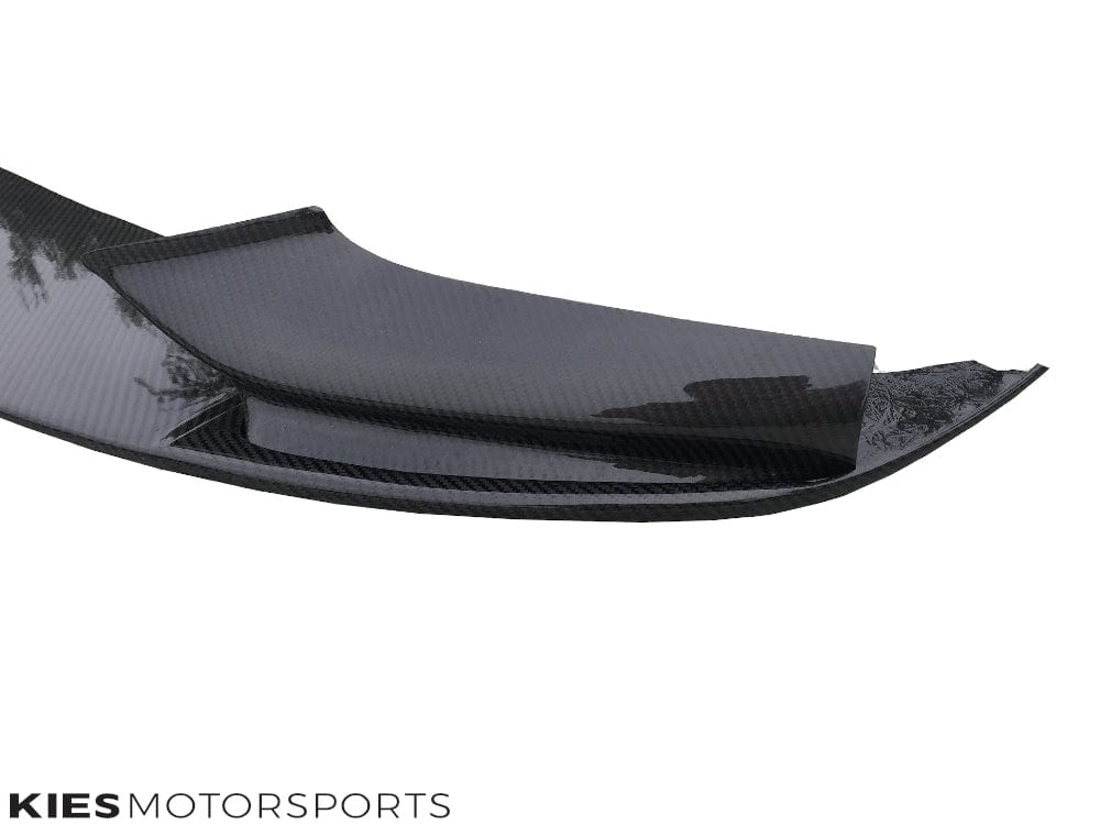 Kies Motorsports — Kies Carbon F10 front lip underside showing mounting points and pre-drilled hardware