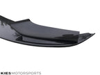 Kies Motorsports — Kies Carbon F10 front lip underside showing mounting points and pre-drilled hardware