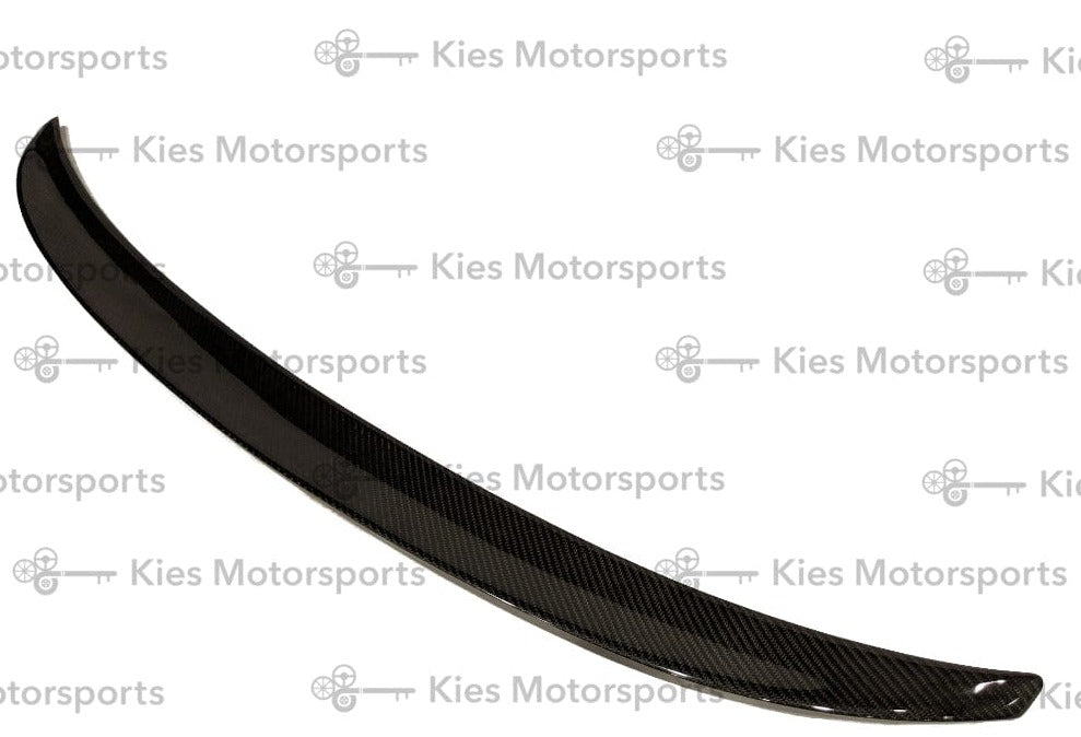 Kies Motorsports — M Performance style carbon fiber trunk spoiler installed on BMW F32 4 Series decklid, rear view showing subtle lip profile