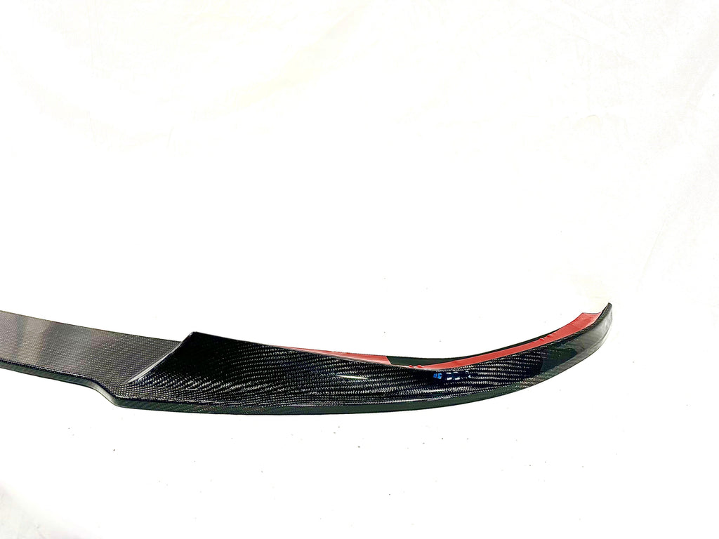 Kies Motorsports — low front angle of G20 3 Series showing the carbon fiber performance front lip's ground clearance and aggressive stance