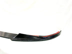 Kies Motorsports — low front angle of G20 3 Series showing the carbon fiber performance front lip's ground clearance and aggressive stance