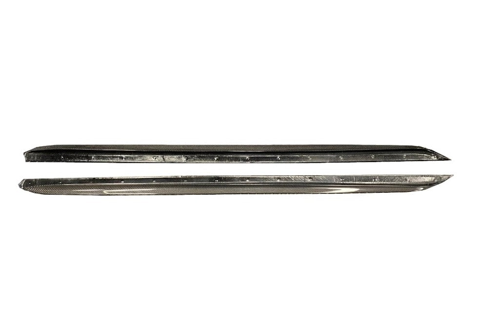 Kies Motorsports — rear three-quarter angle of G20 with carbon fiber side skirt extensions, showing how they complement the rear bumper line