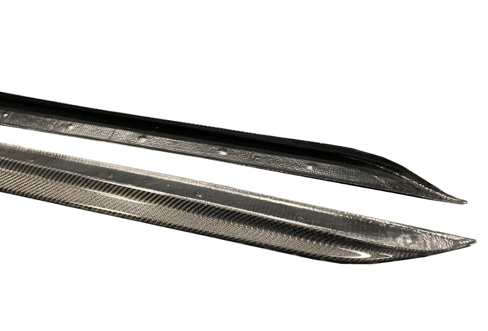 Kies Motorsports — alternate angle of G20 carbon side skirt extension, emphasizing carbon fiber finish and aero styling against the body color