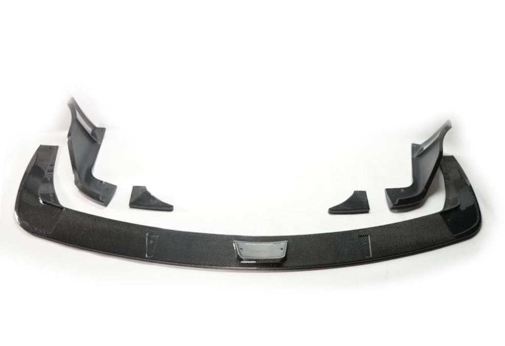 Kies Motorsports — low-angle rear view of Toyota A90 Supra with Kies Carbon 5-piece rear diffuser, highlighting fin detail and carbon fiber weave