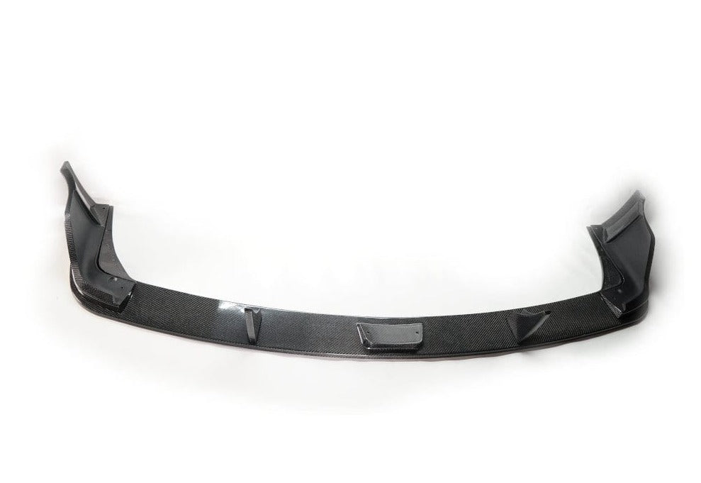 Kies Motorsports — 5-piece carbon fiber rear diffuser installed on Toyota A90 Supra, rear view showing aggressive fin design and wide stance Main image