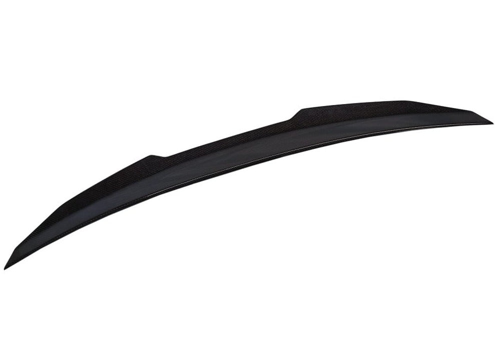 Kies Motorsports — PSM aggressive high kick carbon fiber trunk spoiler on BMW G22 4 Series, rear view showing dramatic upward kick profile Main image
