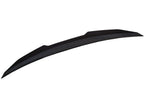 Kies Motorsports — PSM aggressive high kick carbon fiber trunk spoiler on BMW G22 4 Series, rear view showing dramatic upward kick profile