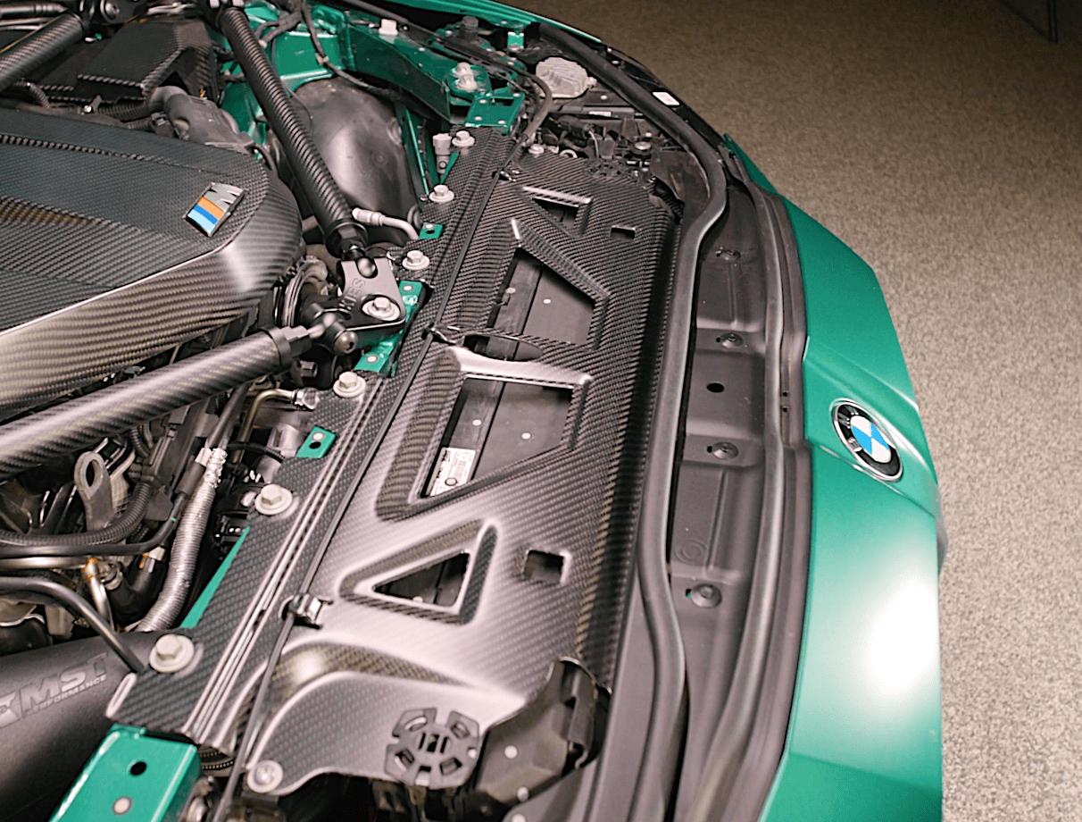 Kies Motorsports — close-up detail of BMW G8X Matte Dry Carbon Engine Bay Kit for the M2 / M3 / M4