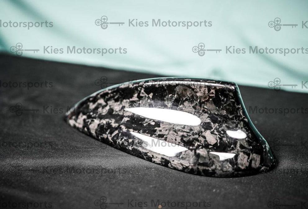 Kies Motorsports — BMW shark fin antenna with Kies Carbon forged carbon overlay, roof-level view showing seamless fitment over factory fin