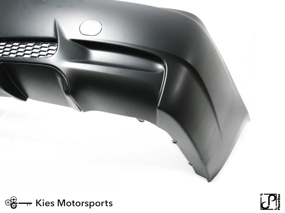 Kies Motorsports — detailed texture shot of 2007-2012 BMW 3 Series (E92 / E93) "M3 Style" Rear Bumper Conversion w/o PDC