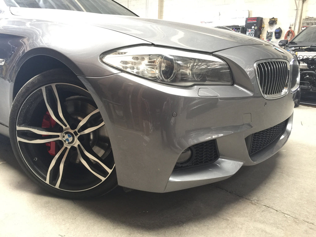 Kies Motorsports — rear angle view of 2011-2013 BMW 5 Series (F10) M Sport Style Front Bumper Conversion Pre-LCI