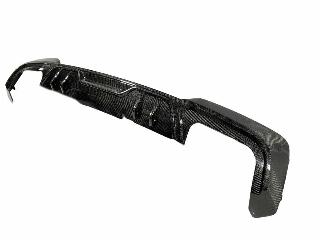 Kies Motorsports — Kies Carbon rear diffuser installed on BMW G01 X3 M40i showing aggressive rear styling