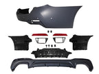 Kies Motorsports — BMW G30 rear bumper conversion, installed on vehicle, rear three-quarter view, G30