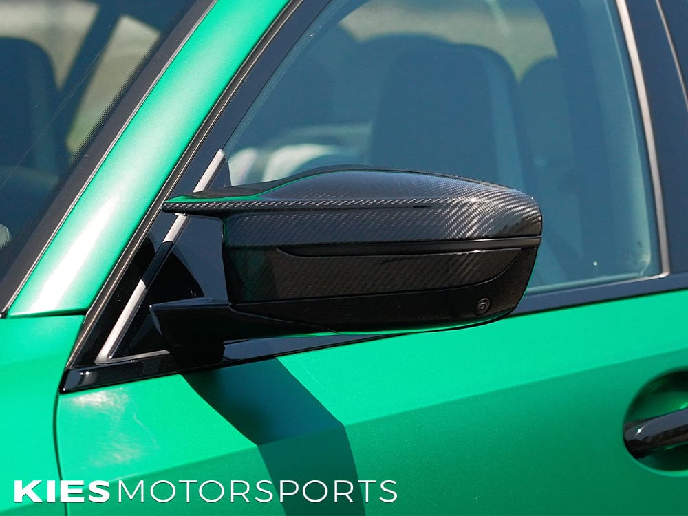 Kies Motorsports — Kies sequential turn signal installed on BMW G20 3-Series side mirror showing smoked look