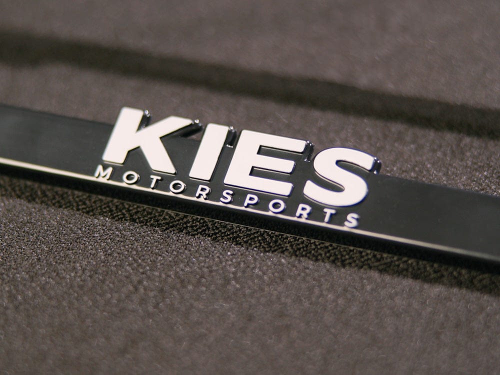 Kies Motorsports — Kies plate frame angle view showing slim profile and black finish