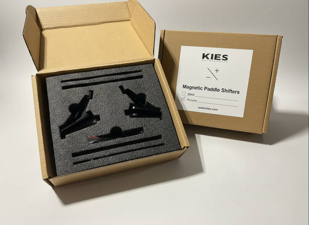 Kies Motorsports — detailed texture shot of Kies Motorsports Porsche 992 Aluminum Alloy (Black) w/ Carbon Fiber Option Magnetic Paddle Shifters