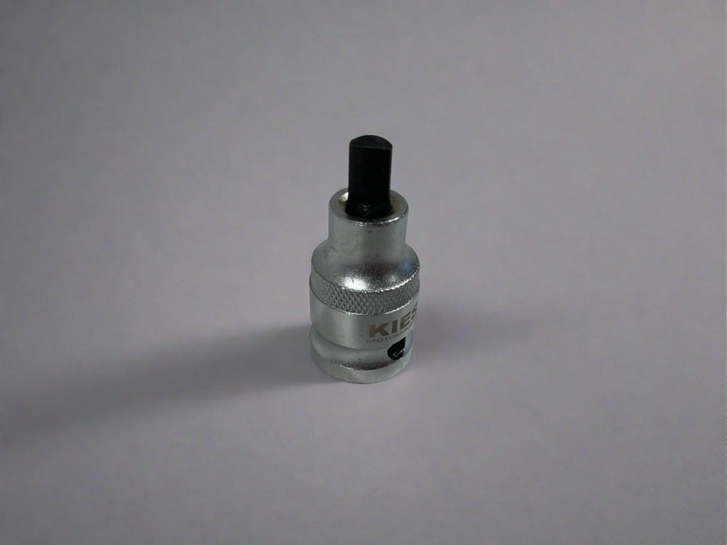 Kies Motorsports — Kies spindle tool tip detail showing precision-machined spreader wedge profile