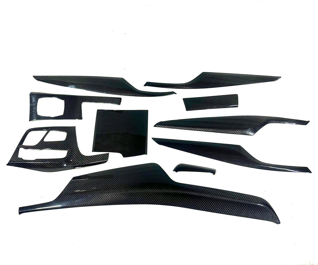 Kies Motorsports — Kies G30 center console carbon overlay showing precision cutouts for controls