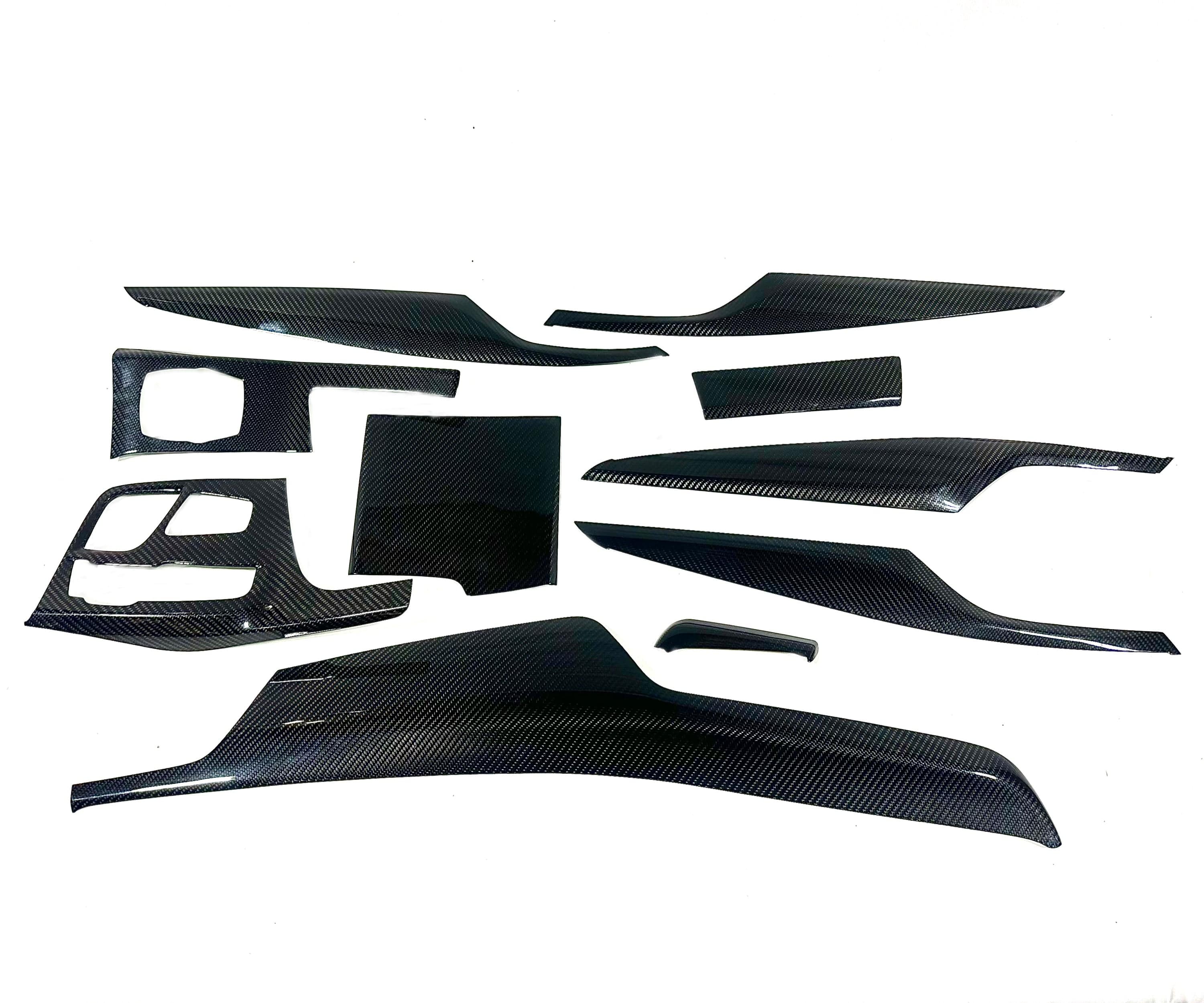 Kies Motorsports — Kies G30 center console carbon overlay showing precision cutouts for controls