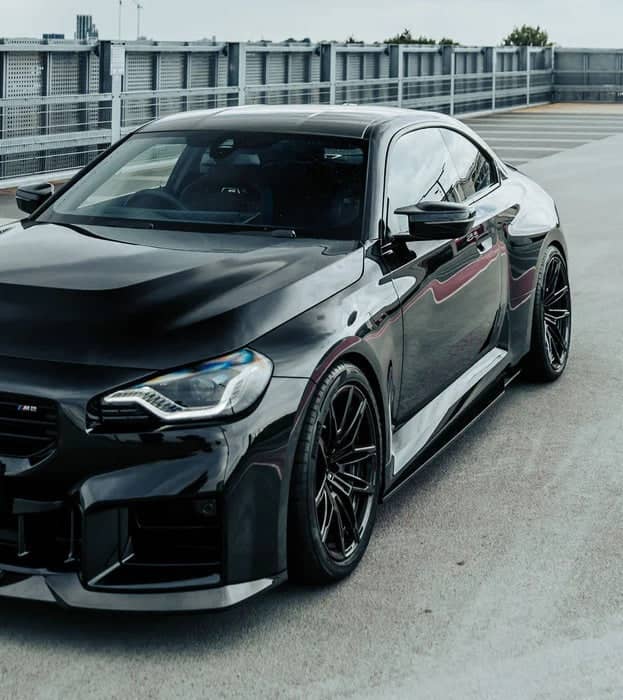 Kies-Motorsports NWCarbon Haus G87 Dry Carbon Fiber Side Skirt Extensions