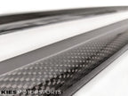 Kies Motorsports — BMW F32 4 Series with 3D carbon fiber side skirt extensions installed, low angle front-quarter view emphasizing ground-hugging stance