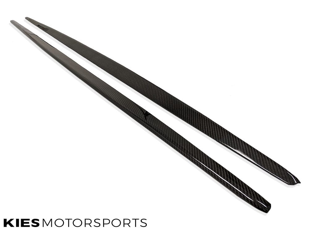 Kies Motorsports — performance-inspired carbon fiber side skirt extensions installed on BMW F22 2 Series coupe, side profile showing ground-hugging aero