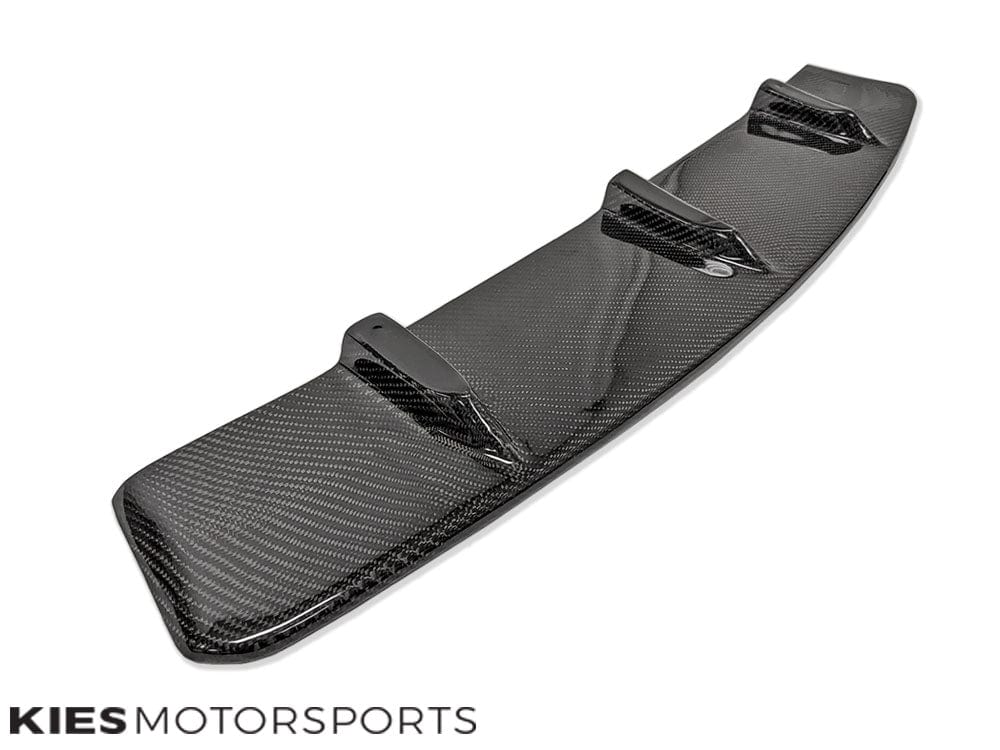 Kies Motorsports — close-up of center section of JGS carbon fiber front lip for BMW G30 Pre-LCI, showing carbon weave and center splitter profile