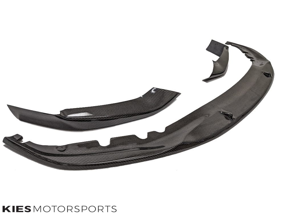 Kies Motorsports — low-angle front view of BMW G30 Pre-LCI with carbon fiber performance front lip, emphasizing aggressive lowered stance