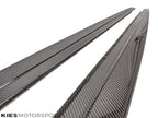 Kies Motorsports — close-up detail of carbon fiber weave and mounting edge on G30 performance side skirt extension, quality finish visible