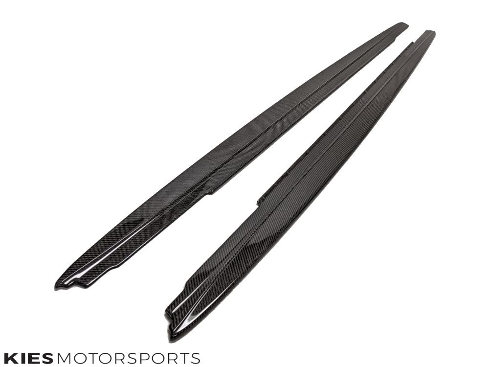 Kies Motorsports — performance-inspired carbon fiber side skirt extensions on BMW G30 5 Series, side profile showing full-length aero enhancement Main image